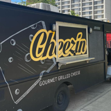 Cheezin Gourmet Grilled Cheese logo